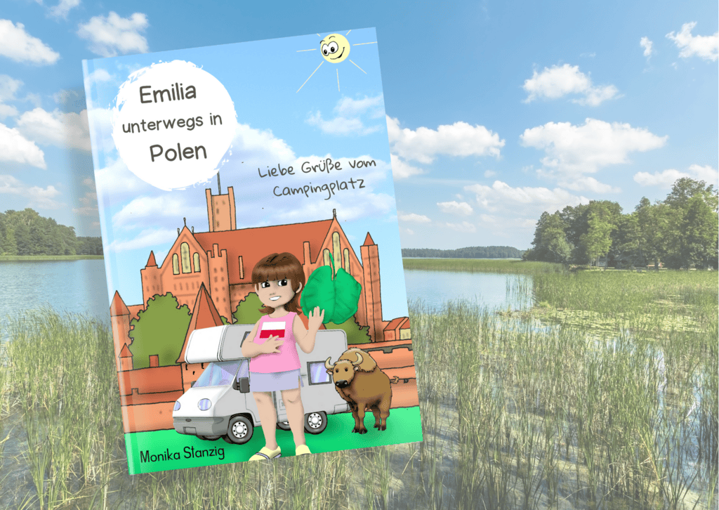 Das Buch Emilia unterwegs in Polen befindet sich vor einem See
